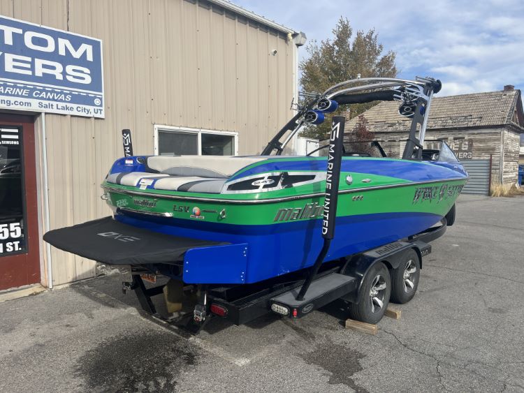 Malibu 247 with Illusion G3 tower and factory bimini Double Up Storage Cover