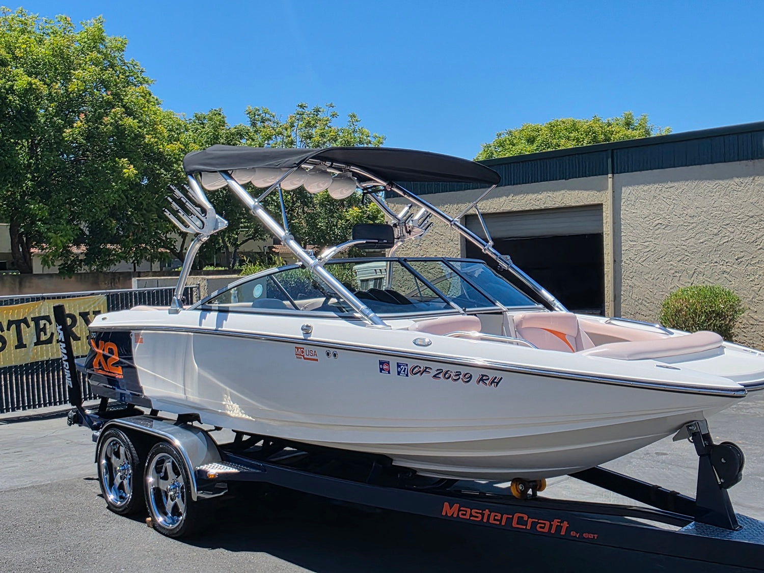mastercraft x2 with aftermarket bimini top