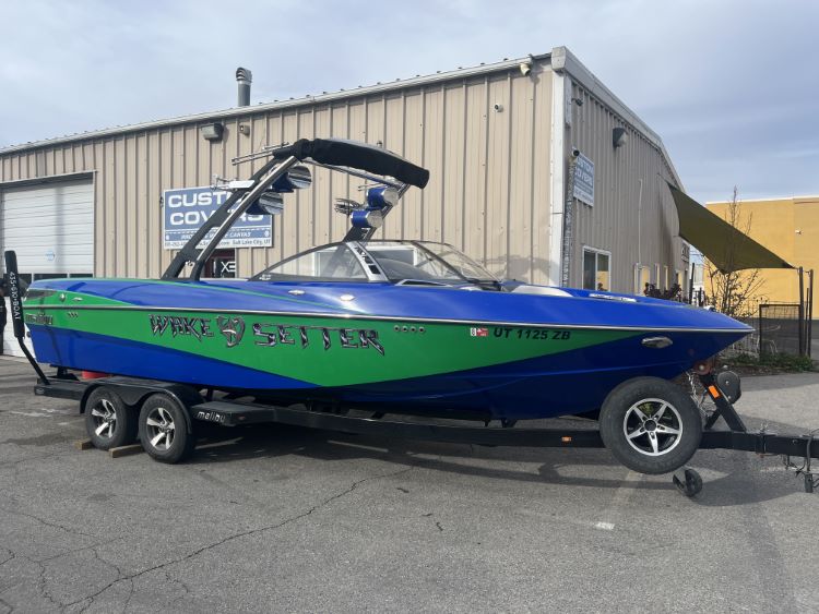 Malibu 247 with Illusion G3 tower and factory bimini Double Up Storage Cover