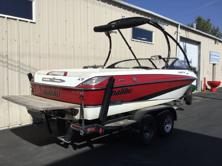 Malibu Sunsetter XTi with Titan 3 Tower and FCT bimini Double Up Storage cover