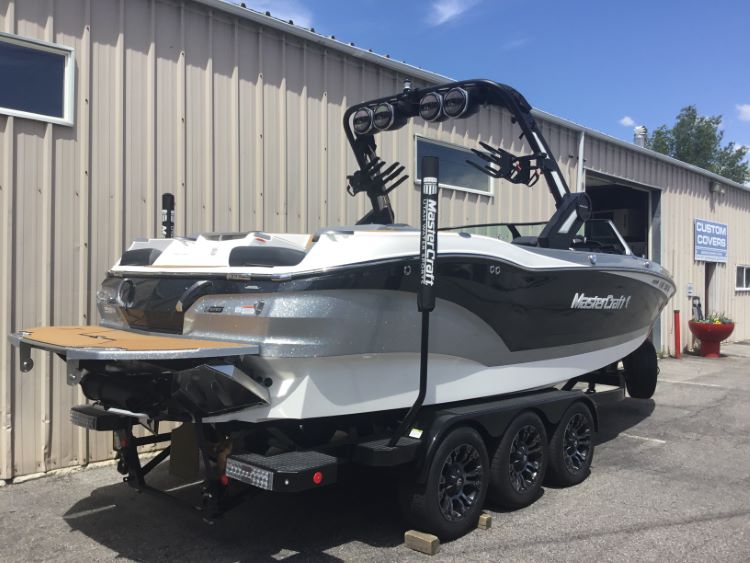 MasterCraft X24 with ZFT8 - ZFT10 tower and factory bimini Double Up Storage Cover