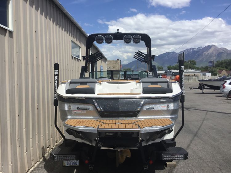 MasterCraft X24 with ZFT8 - ZFT10 tower and factory bimini Double Up Storage Cover