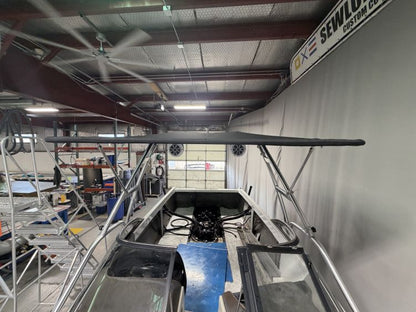 Malibu Wakesetter with Skylon Swoop tower Folding Canopy Top