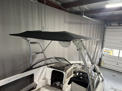 Malibu Wakesetter with Skylon Swoop tower Folding Canopy Top
