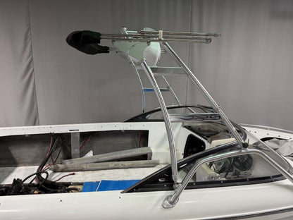 Malibu Wakesetter with Skylon Swoop tower Folding Canopy Top