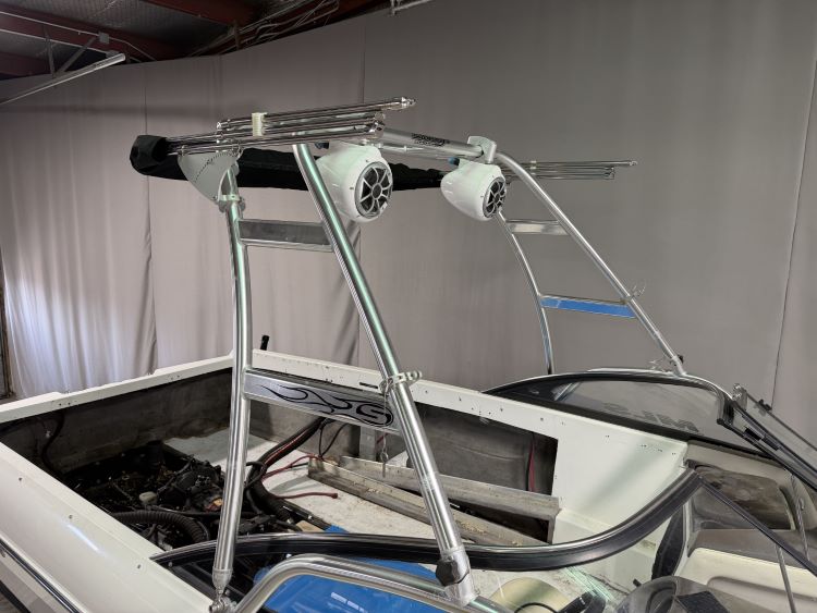 Malibu Wakesetter with Skylon Swoop tower Folding Canopy Top