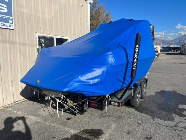 Malibu 247 with Illusion G3 tower and factory bimini Double Up Storage Cover