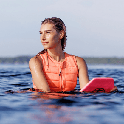 Follow Total Ladies Comp Wake Vest in Melon