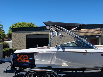 over the tower bimini top shown on a white 2006 mastercraft x2